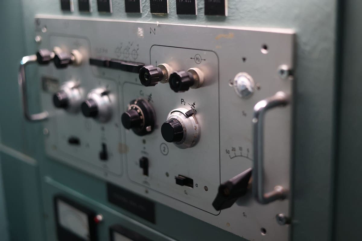 A control panel with setting buttons and a small display
