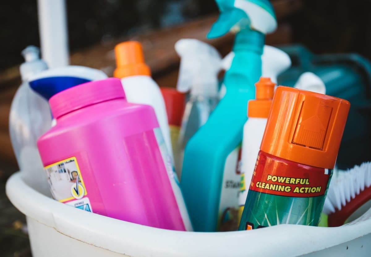 Cleaning supplies gathered in a bucket ready for use